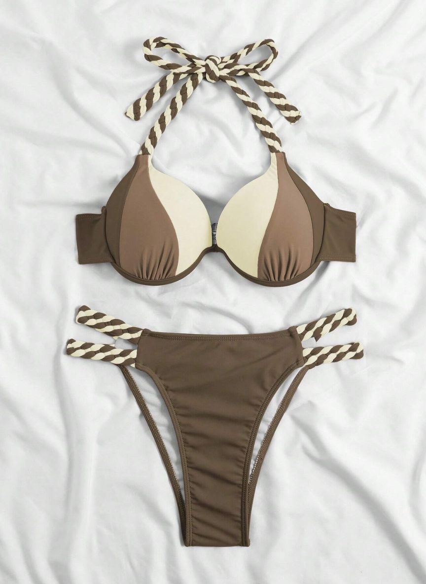 Descubra o Biquíni Trançado Color Block Mattie com Alças Trançadas design color block vibrante, alças trançadas e sutiã push-up. O look energético e moderno para o seu verão. Confira.