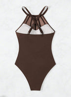 Realce suas curvas com o Maiô Virgínia. Design com transparência em tule na cintura, decote halter e costas cruzadas. O equilíbrio perfeito entre o sexy e o elegante.