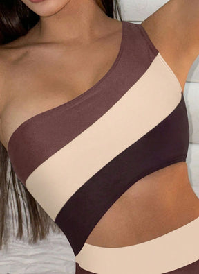 Conheça o Maiô Ártemis: design assimétrico de um ombro só, recorte vazado na cintura e estampa em blocos de cores que alonga a silhueta. Estilo e luxo. Confira.