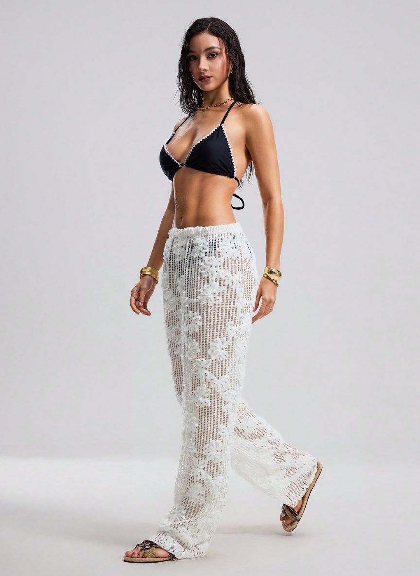 Calça Saída de Praia Noémie em Tricô Floral com Transparência, Baha Morenna